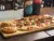 Promo Gourmet para 2 – Pizza (8 porciones) + 2 empanadas + bebida
